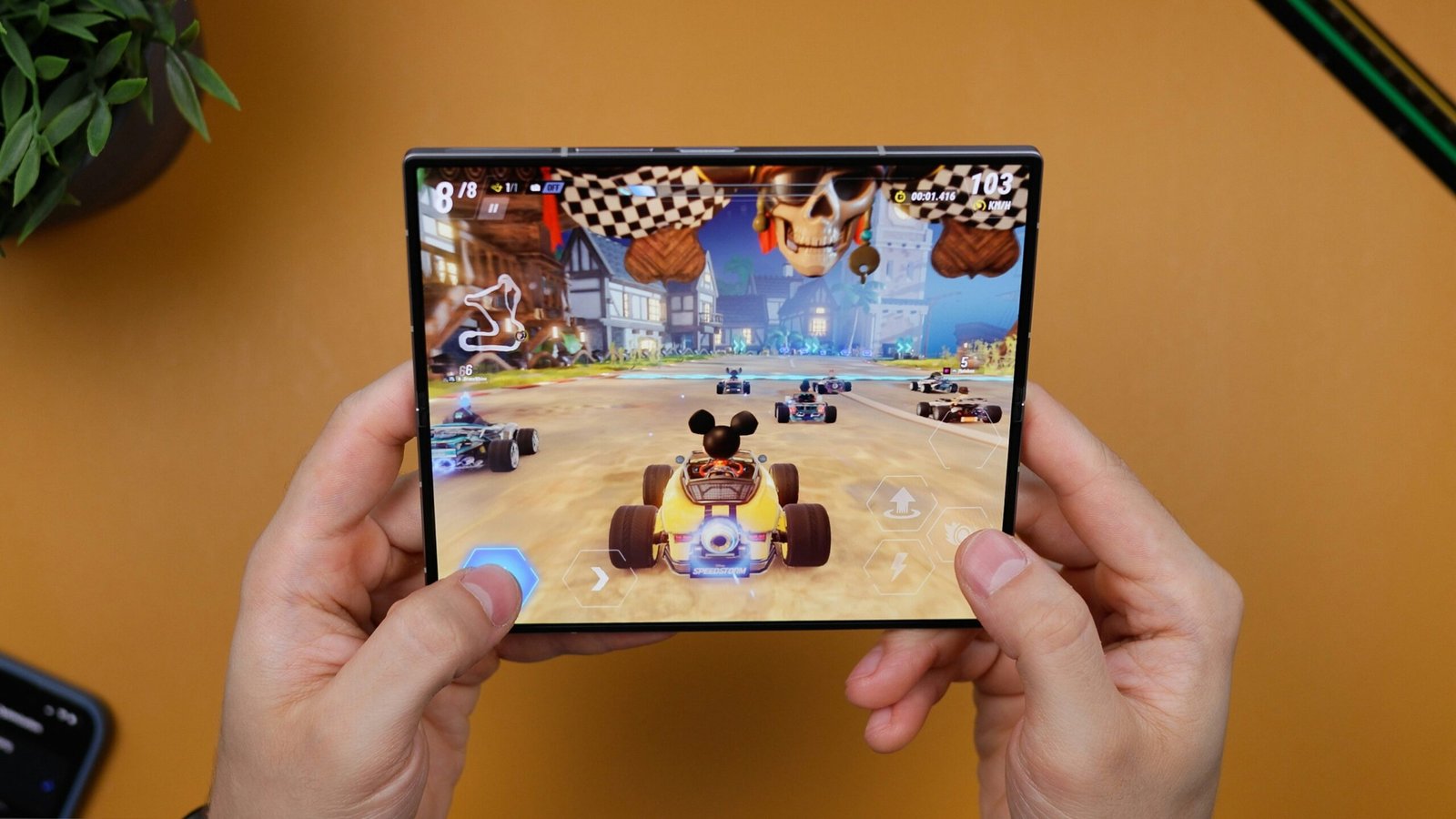 a person holding a A person holding a video game in their hands